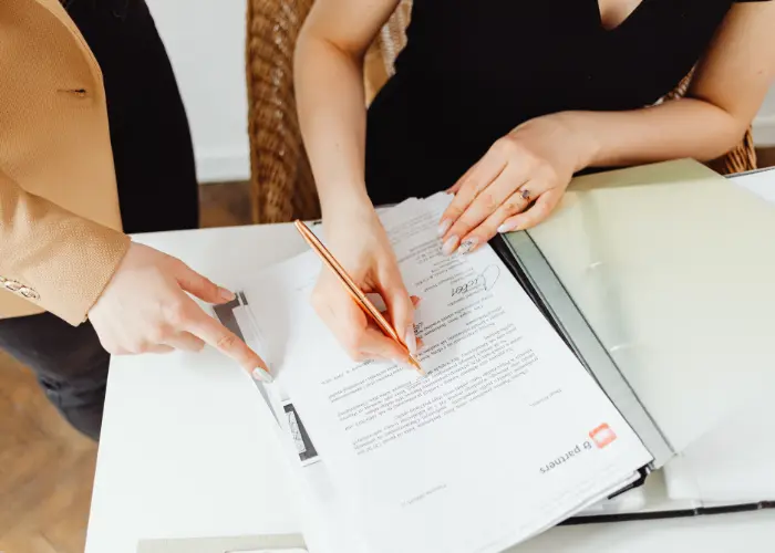 Legal professional reviewing Power of Attorney documents