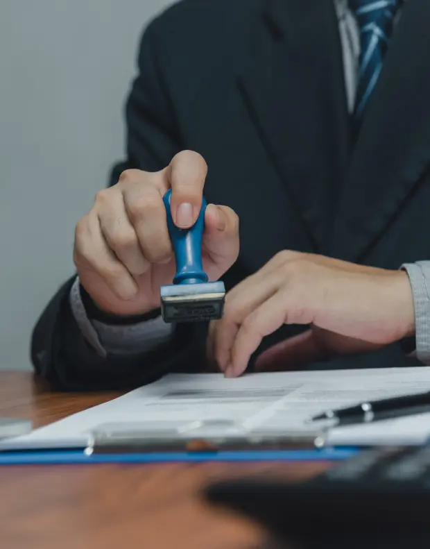 New American Hope LLC consultant helping a client prepare a Pakistani Visa application